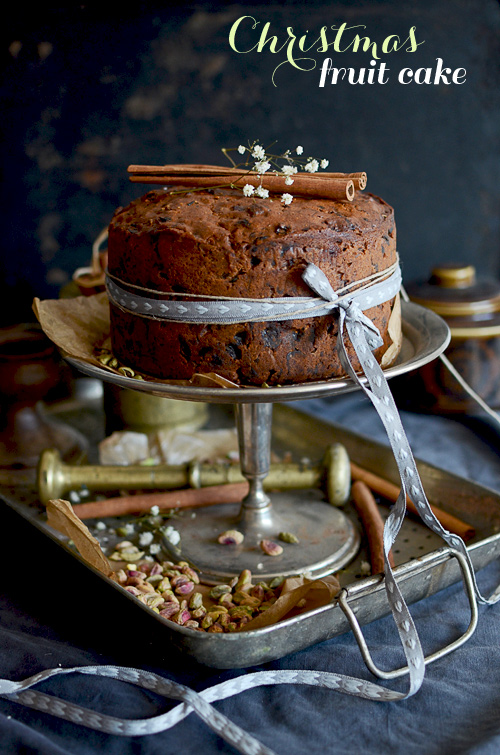 Traditional maturing Christmas fruit cake with pistachios and apricots