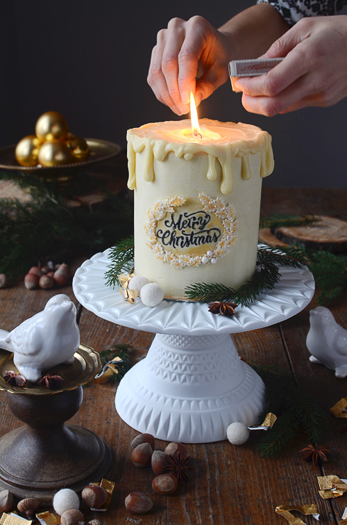 Bake yourself a Christmas candle cake, decoration and a dessert in one! Cranberry Gingerbread cake and white chocolate ganache just delicious