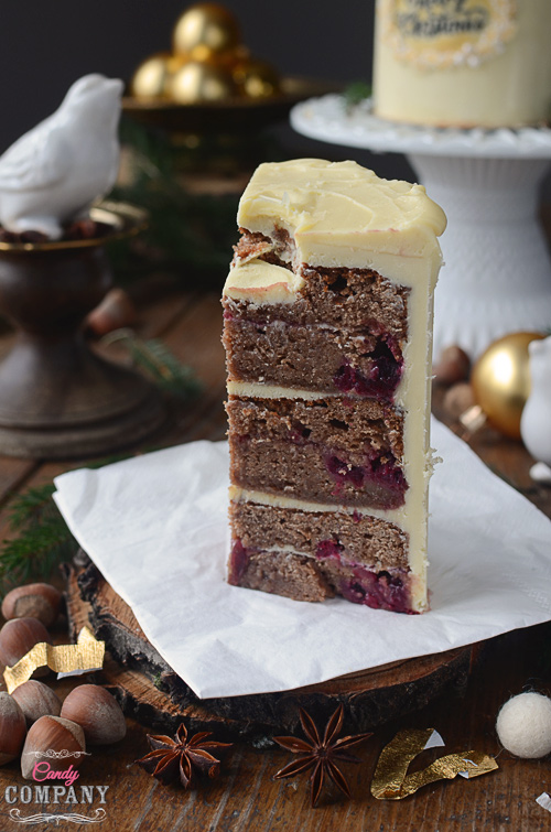 Bake yourself a Christmas candle cake, decoration and a dessert in one! Cranberry Gingerbread cake and white chocolate ganache just delicious