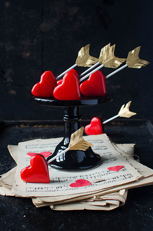 Chocolate and chili cake pops with red mirror glaze perfect romantic gift for Valentines!