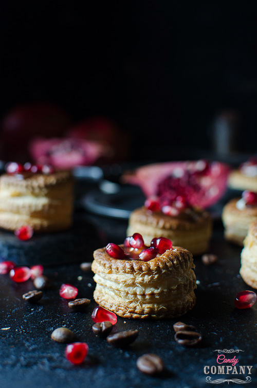 Puff pastry coffee cups with coffee caramel sauce and pomegranate seeds