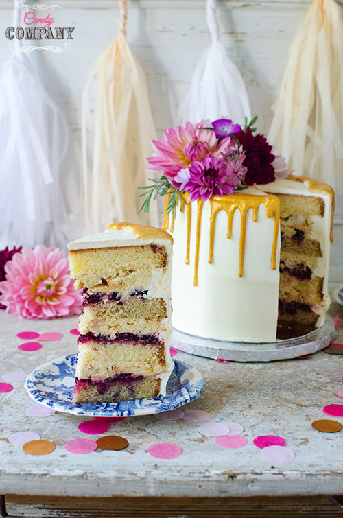 Glamour gold drip birthday cake with fresh flowers arangement 