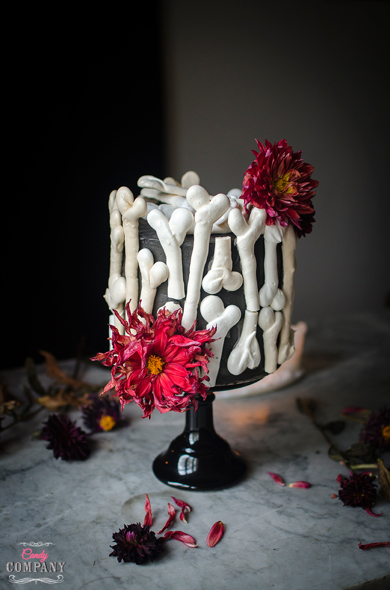 Meringue bone Halloween cake. Chestnut mousse and raspberry and rose petal jam mousse cake. Food photography by Candy Company